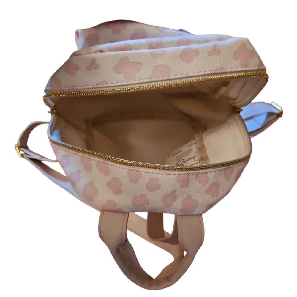 Jessica Simpson Cream, Pink, and Tan Animal Print Backpack, Compact
